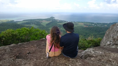 couple sitting on top of Mappe mountain