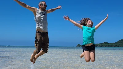 Family playing at the beach